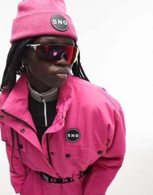 Topshop Sno ski suit with funnel neck & belt in pink